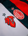AC Milan Local 25/26 con parches de la UCL