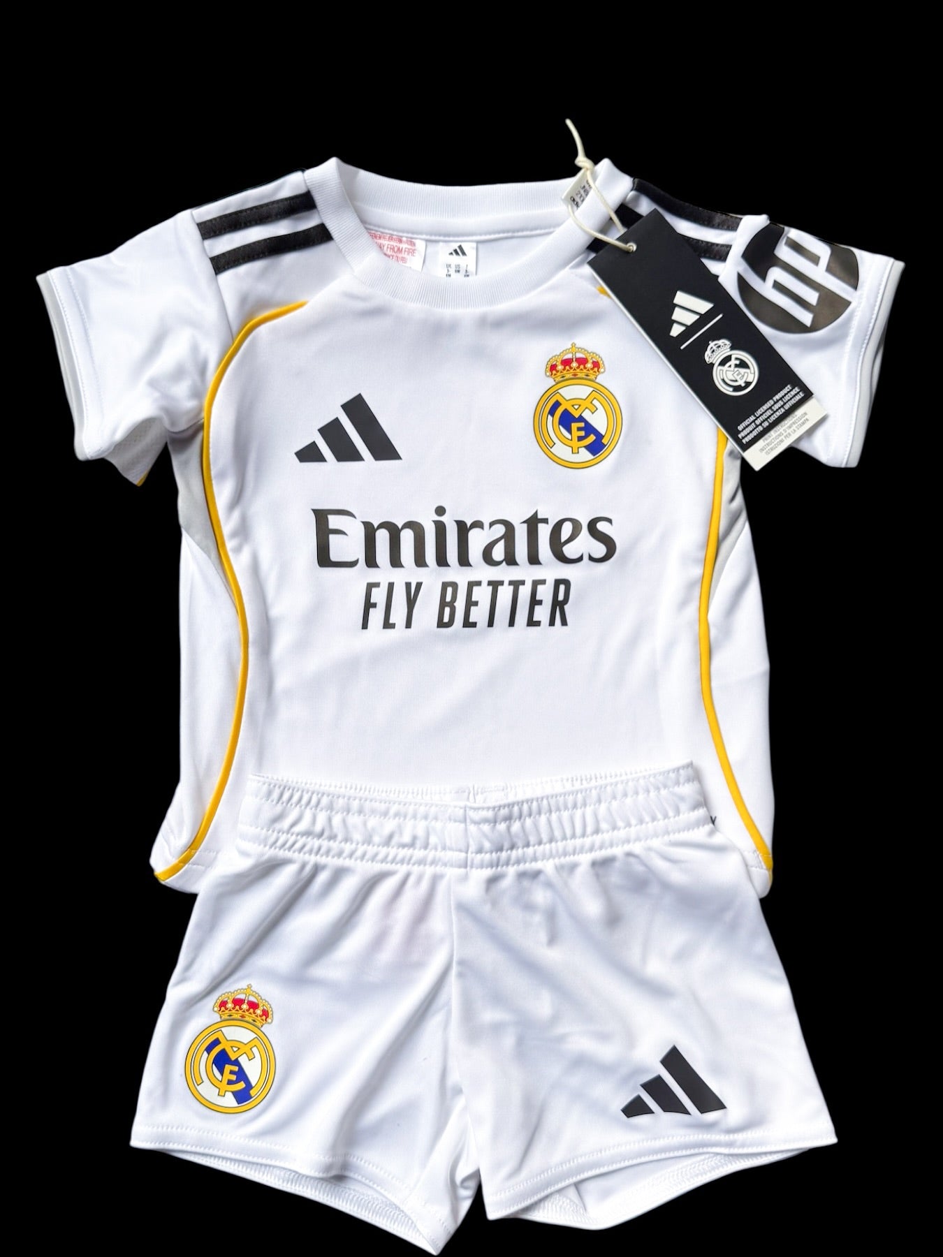 Real Madrid Local 25/26 con parches de la UCL para niño (incluye pantaloneta)